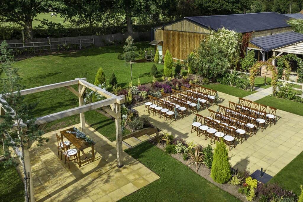 Outdoor ceremonies at The Pergola - Walk through the arches into your new life together